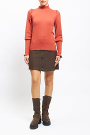 Maglia con collo alto con polsini a costine