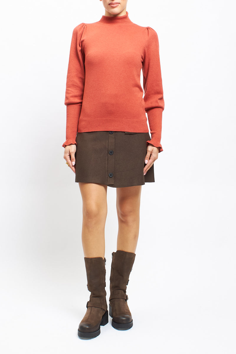 Maglia con collo alto con polsini a costine