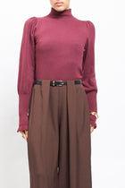 Maglia con collo alto con polsini a costine