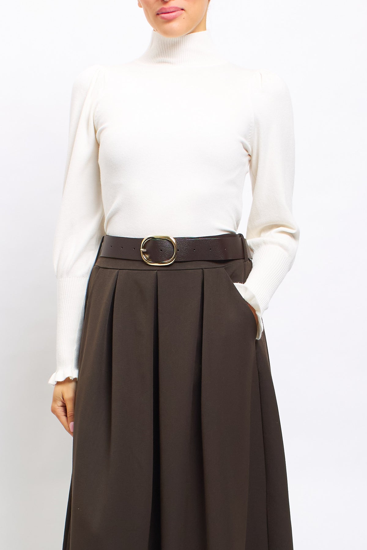 Maglia con collo alto con polsini a costine