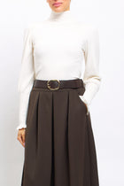 Maglia con collo alto con polsini a costine