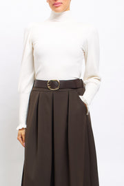 Maglia con collo alto con polsini a costine