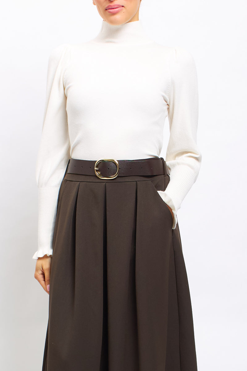 Maglia con collo alto con polsini a costine