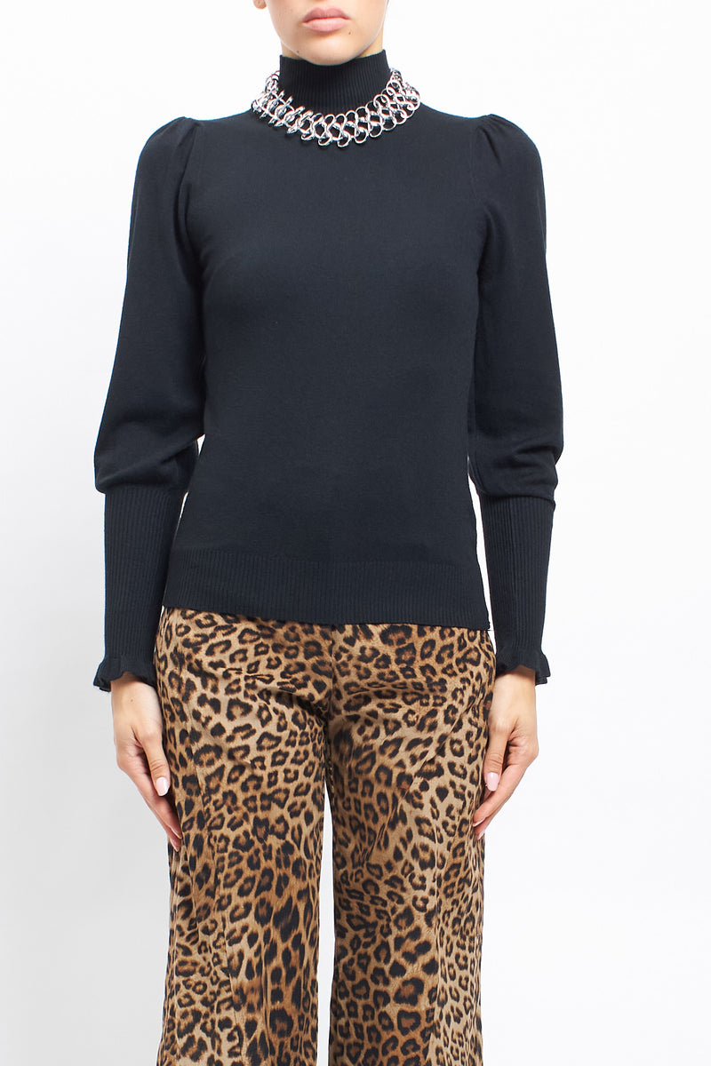 Maglia con collo alto con polsini a costine
