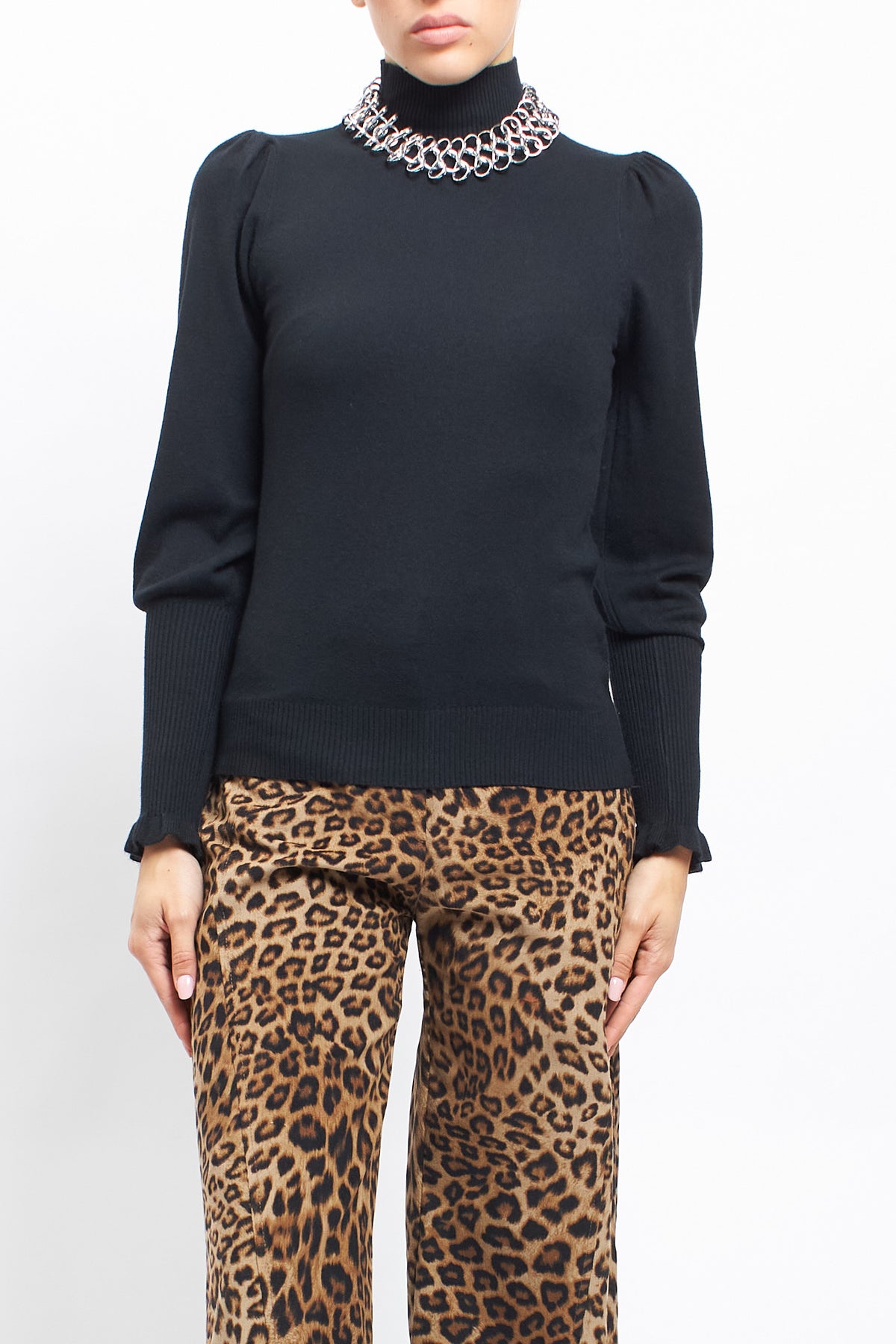 Maglia con collo alto con polsini a costine