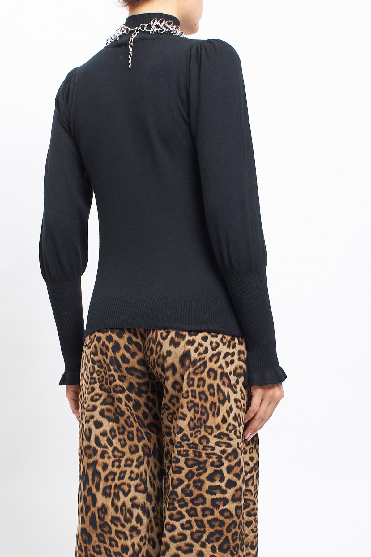 Maglia con collo alto con polsini a costine