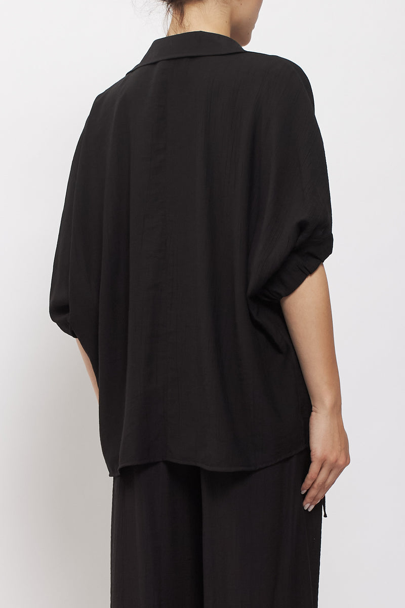Camicia oversize con bottoni gioiello
