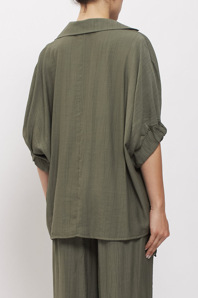 Camicia oversize con bottoni gioiello