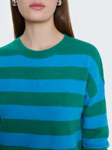 Maglione a righe con bottoncini