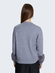 Maglia con inserti in pelliccia