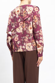 Blusa con fantasia floreale e volan