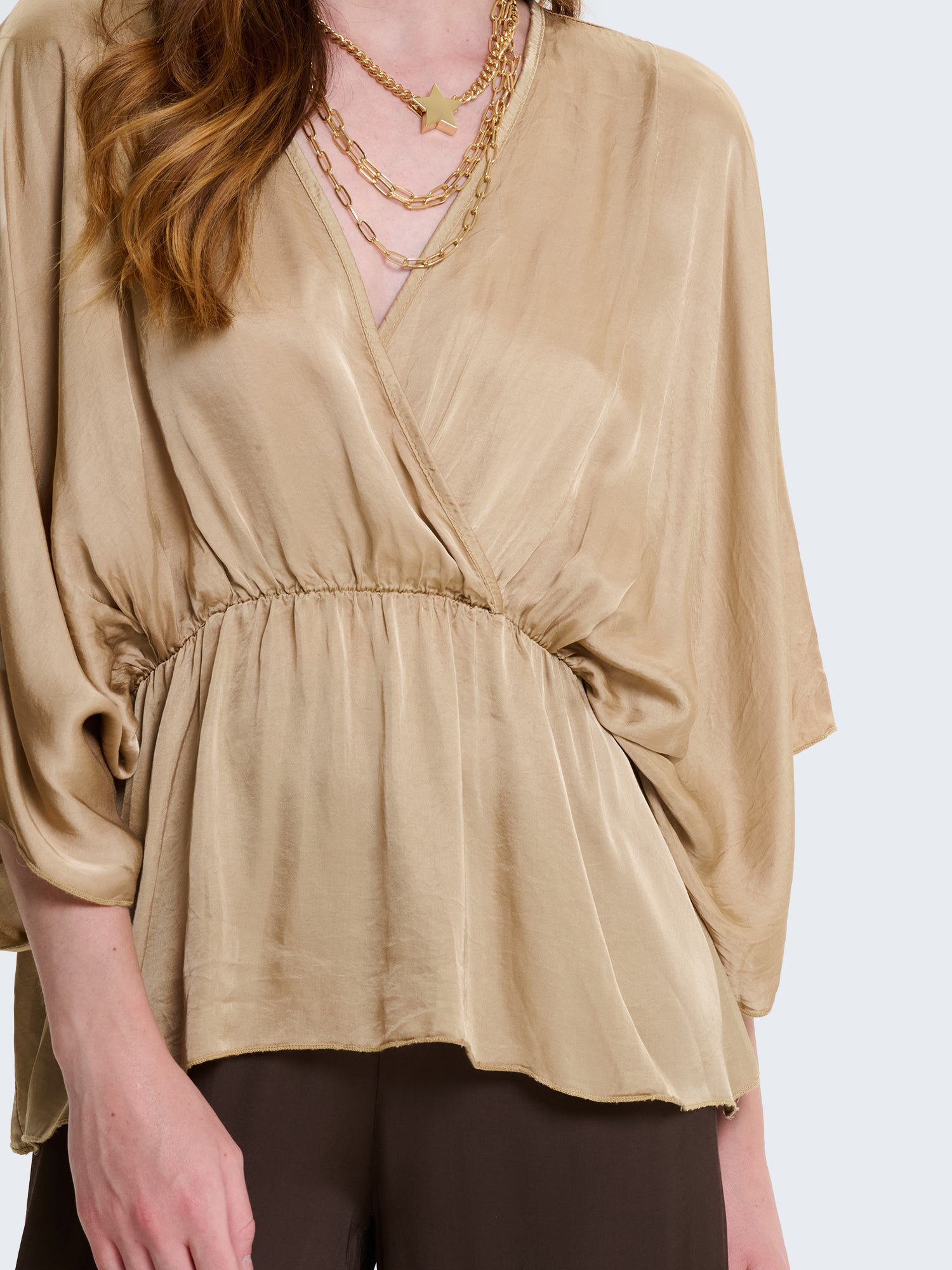 Blusa in raso con incrocio