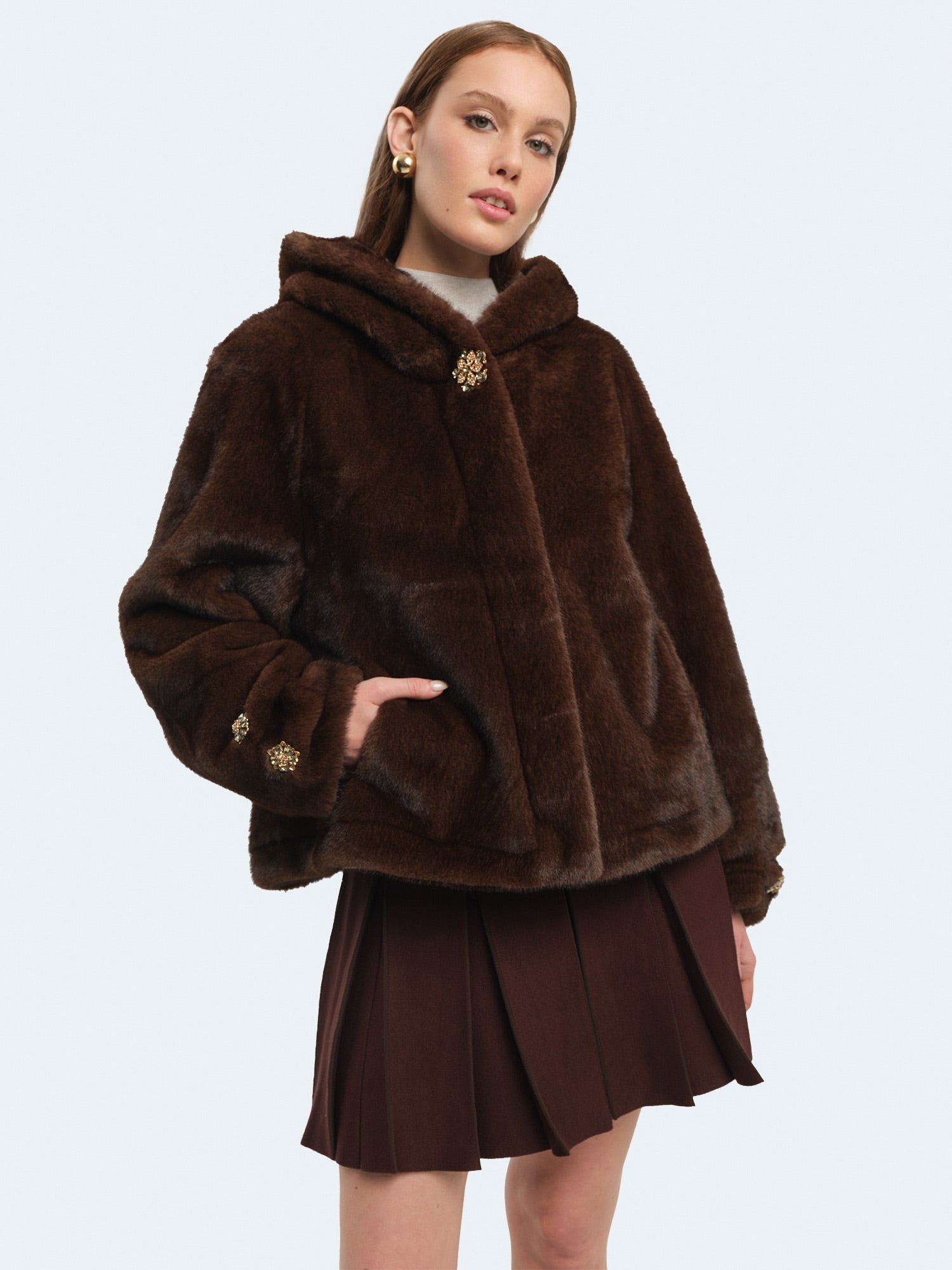 Ecopelliccia effetto montone con cappuccio