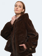 Ecopelliccia effetto montone con cappuccio