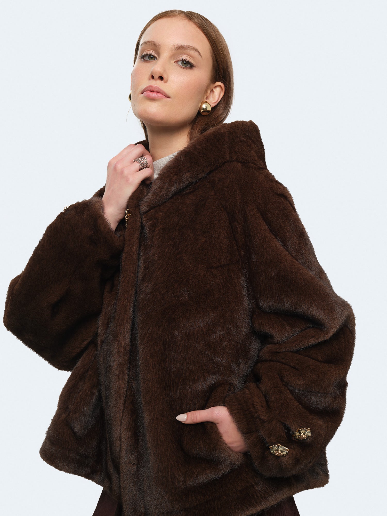 Ecopelliccia effetto montone con cappuccio