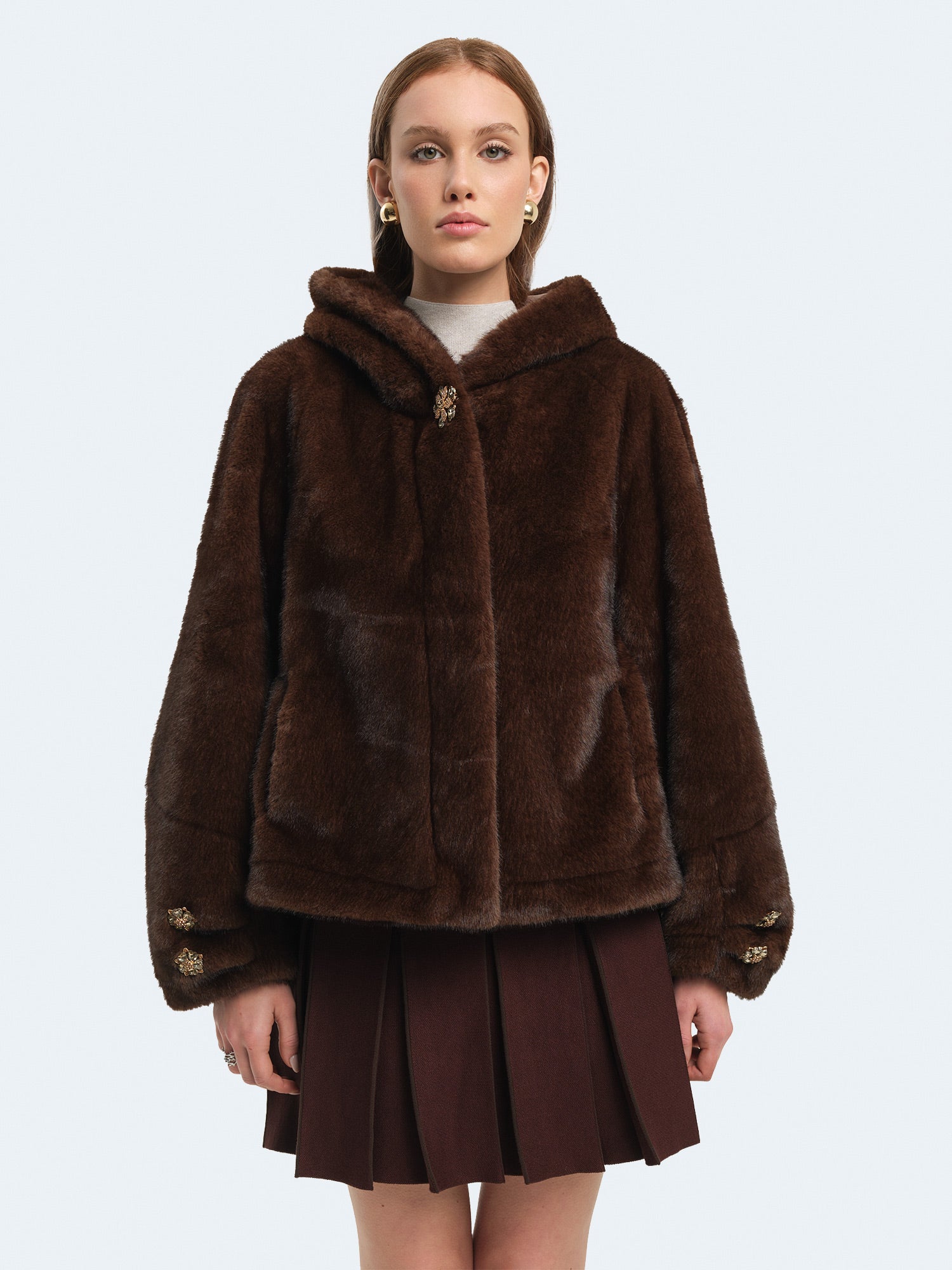 Ecopelliccia effetto montone con cappuccio