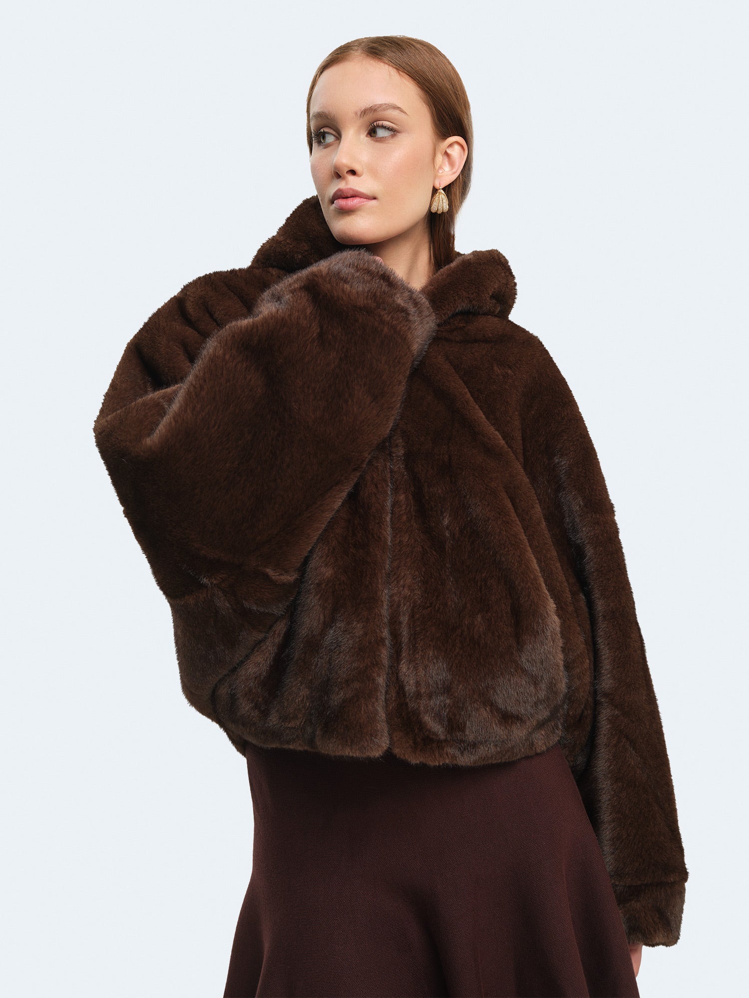 Bomber di pelliccia con cappuccio