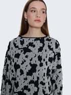 Maglia floccata oversize asimmetrica