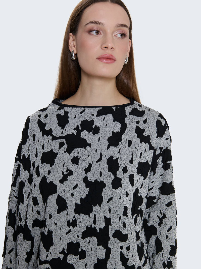 Maglia floccata oversize asimmetrica