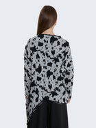 Maglia floccata oversize asimmetrica