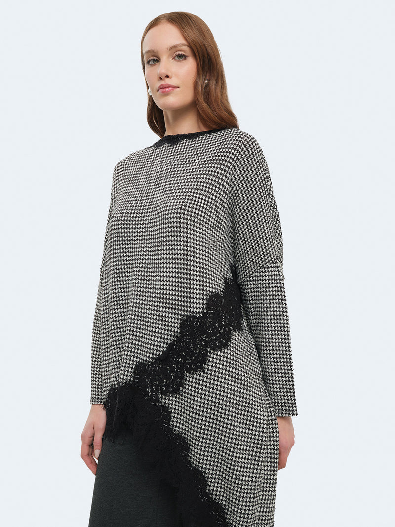 Maglia asimmetrica pied de poul con pizzo