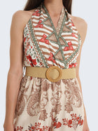 Tuta con scollo halter e cintura