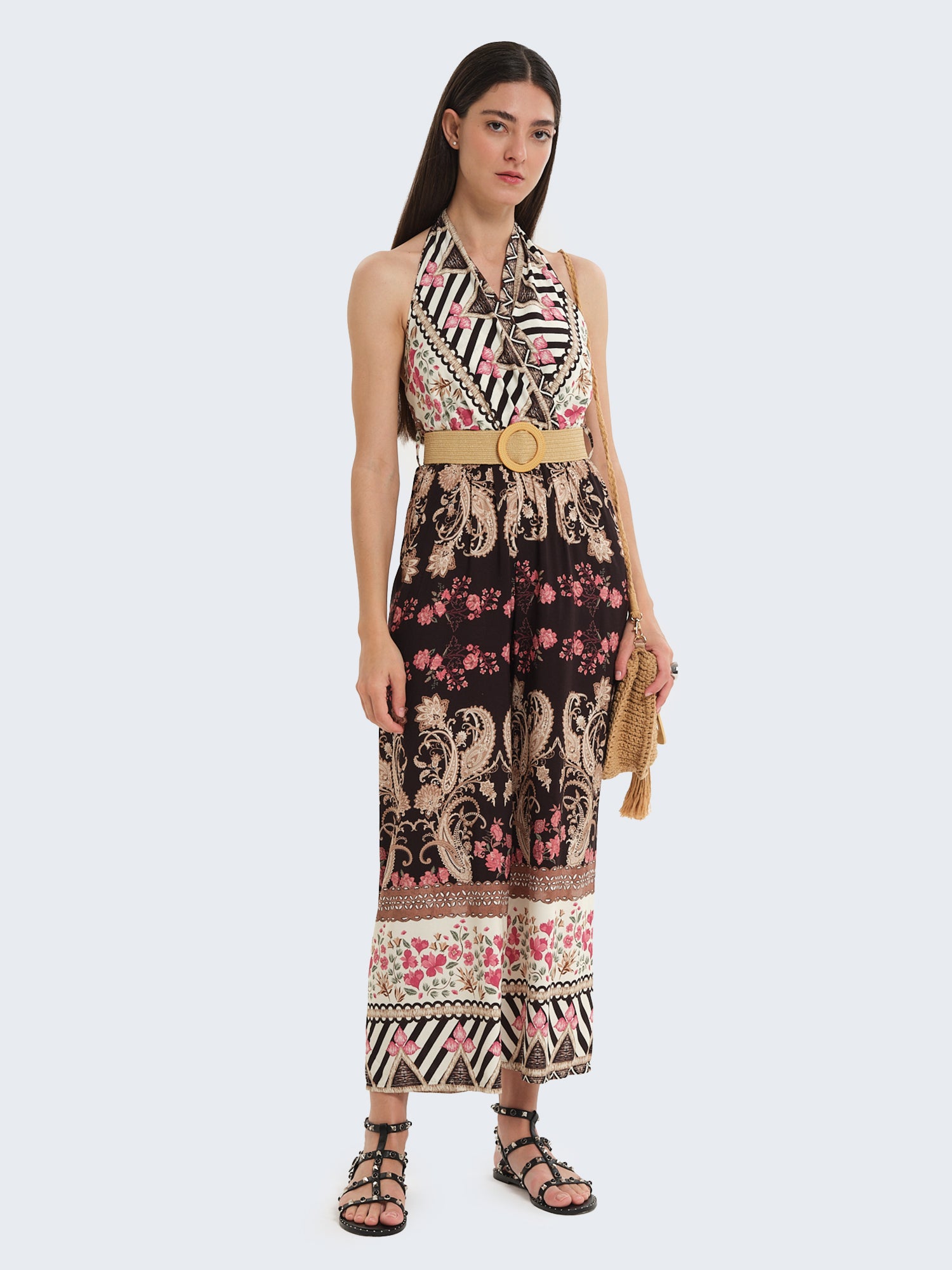 Tuta con scollo halter e cintura