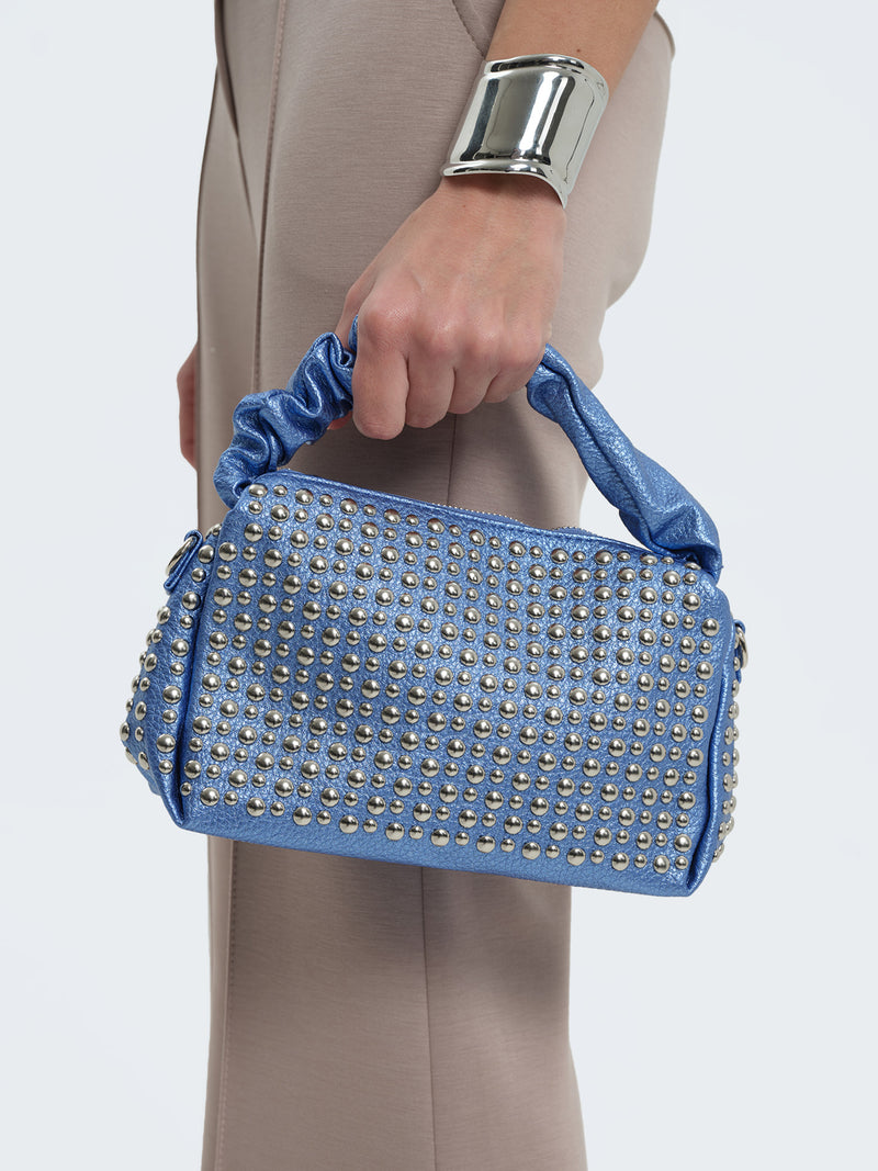 Borsa laminata con borchie