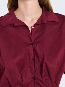 Camicia cropped con maniche corte ampie