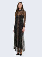 Tight-fitting dress with sheer details and jungle pattern