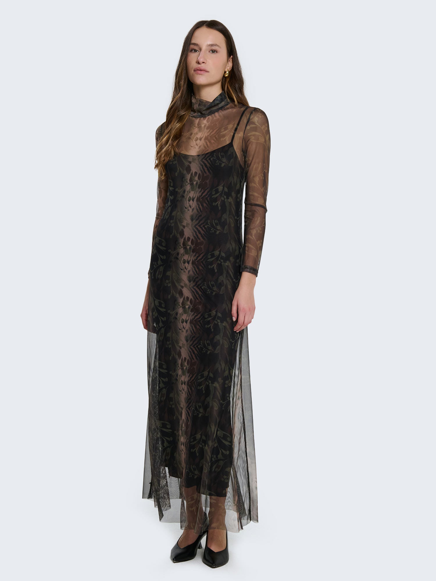 Tight-fitting dress with sheer details and jungle pattern