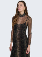 Tight-fitting dress with sheer details and jungle pattern