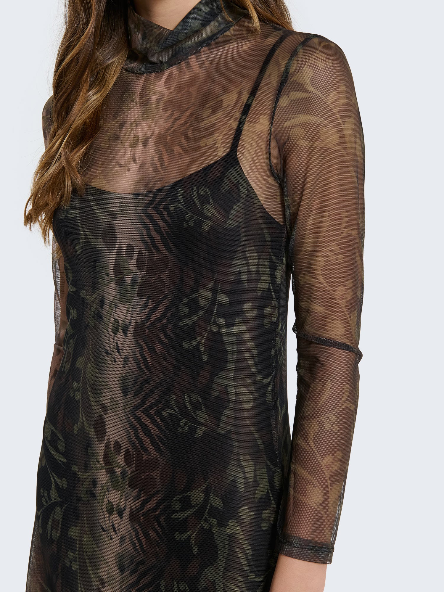 Tight-fitting dress with sheer details and jungle pattern