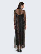 Tight-fitting dress with sheer details and jungle pattern