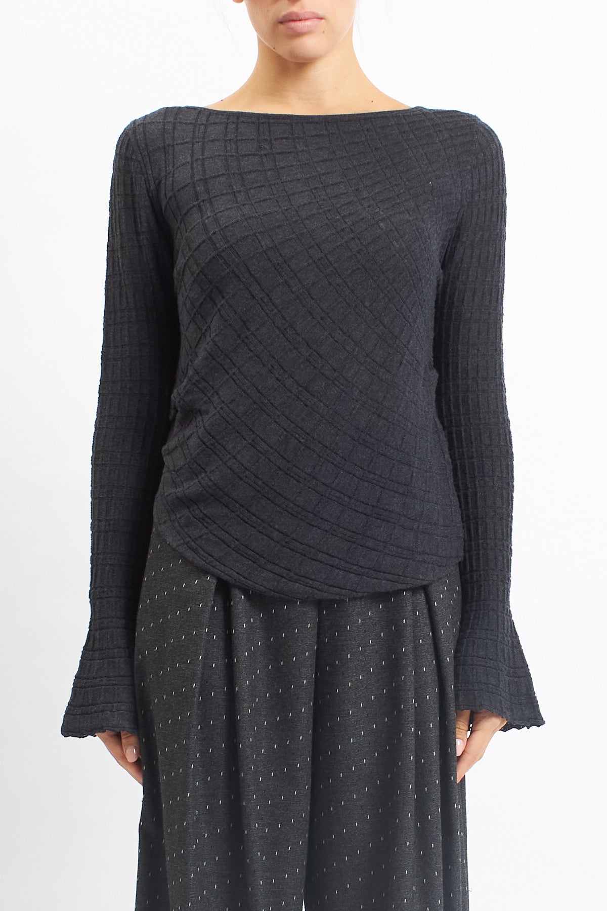 Maglia asimmetrica con manica volant