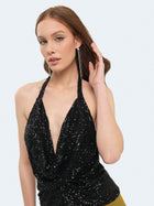 Top scollato in paillettes