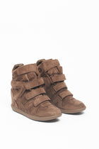 Sneakers a strappo con zeppa