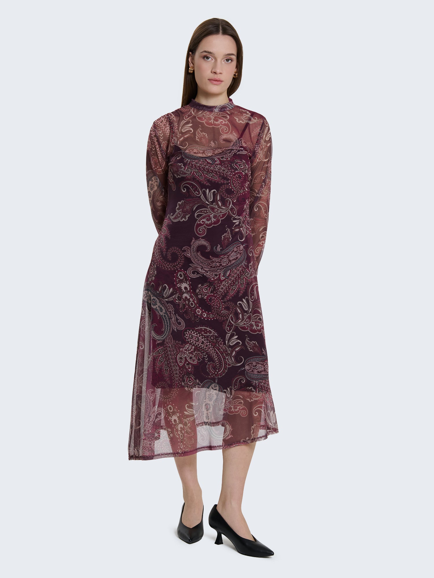 Abito aderente con trasparenze con fantasia paisley