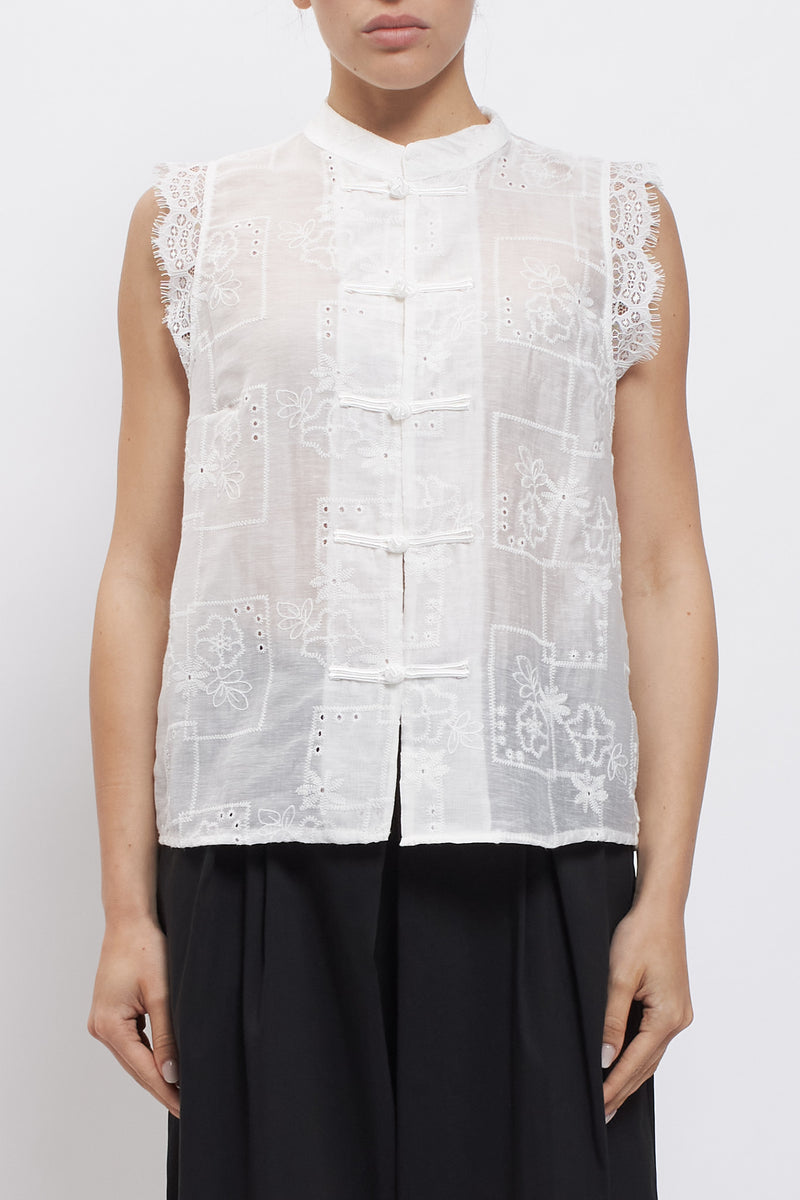 Camicia smanicata con nodi