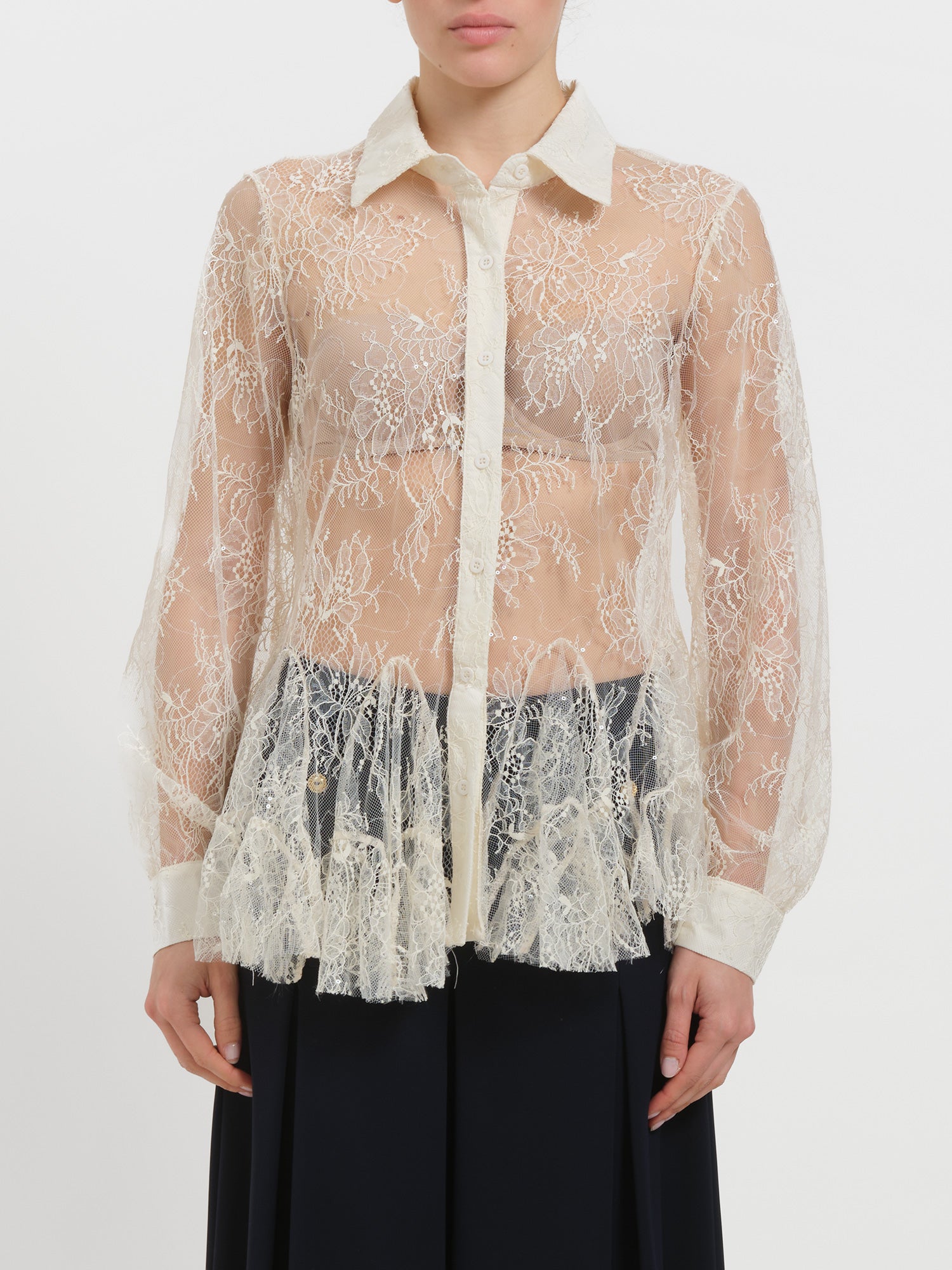 Camicia in pizzo con balze