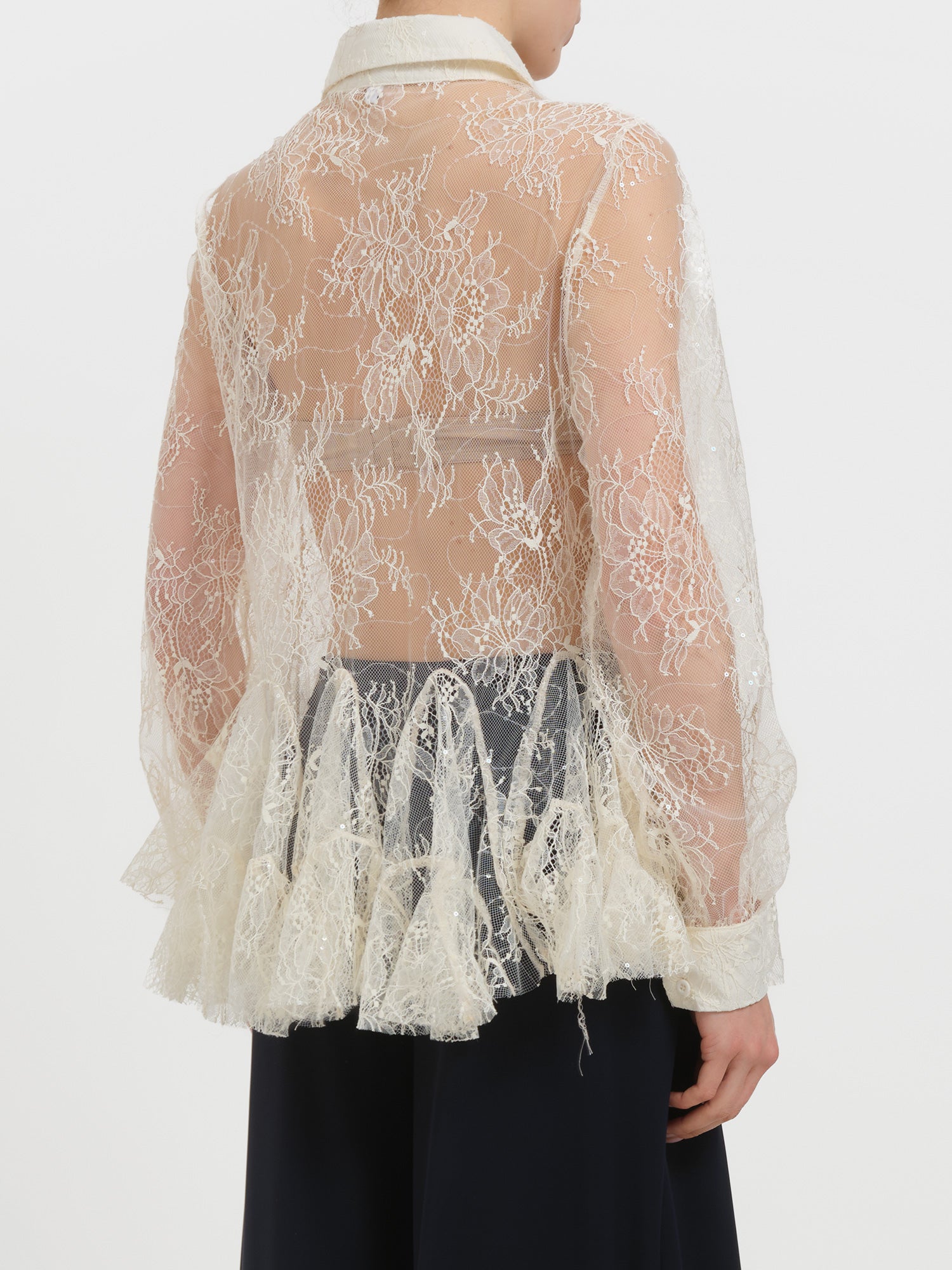 Camicia in pizzo con balze