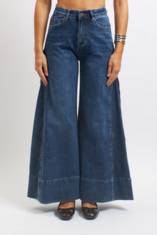 Jeans flare con zip laterali