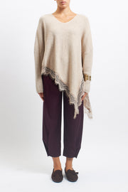 Asymmetrical top with lace inserts