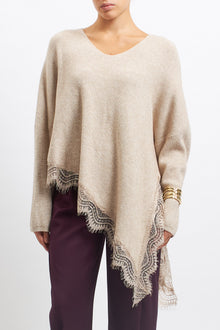Maglia asimmetrica con inserti in pizzo