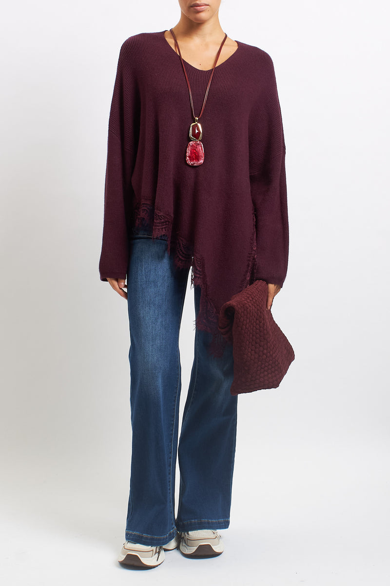 Asymmetric top with lace inserts