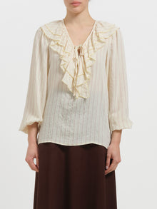 Blusa gessata con collo volant