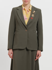 Blazer con spille gioiello