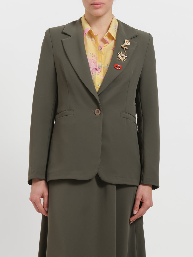 Blazer con spille gioiello