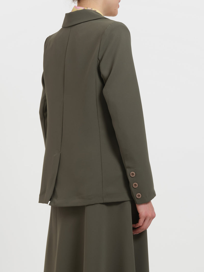 Blazer con spille gioiello