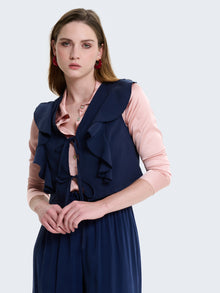 Gilet con laccetti e volant in cupro